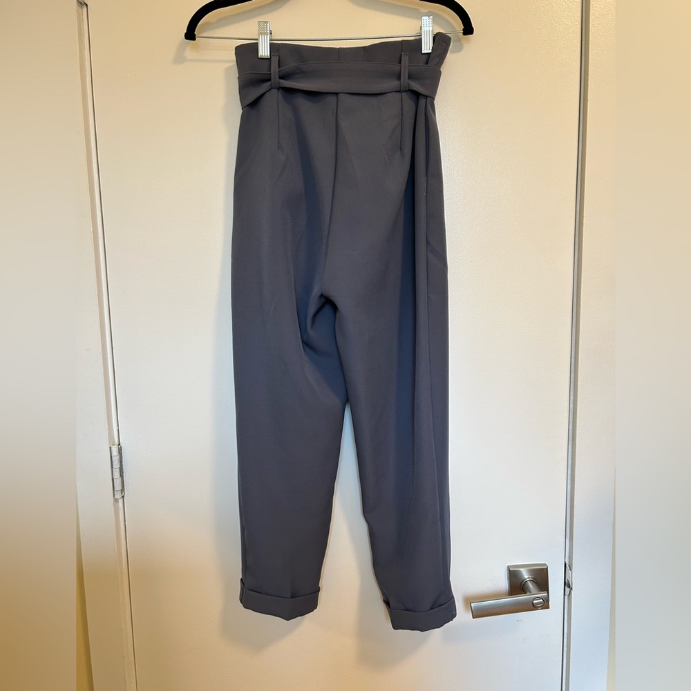 Blue high-waisted, ankle length pants with belt